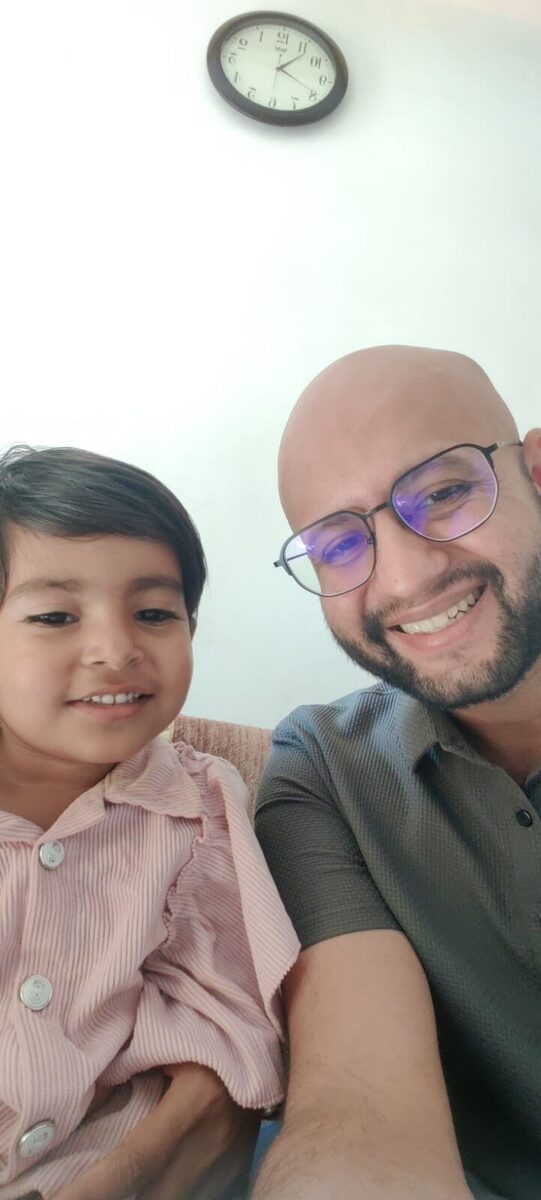 Happy young patient with Dr. Yash